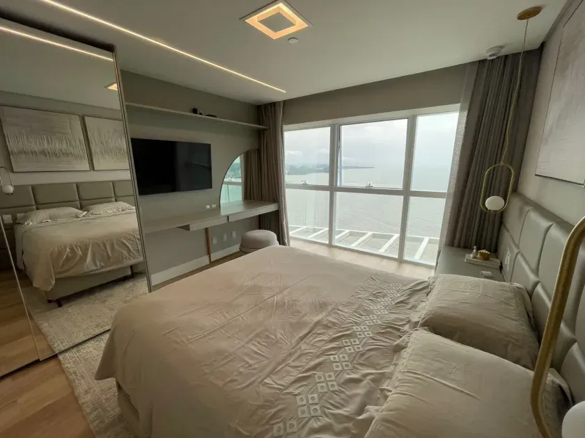Apartamento alto padrão frente mar com 4 suítes e 3 vagas de garagem - Av. Atlântica/SC — foto 24